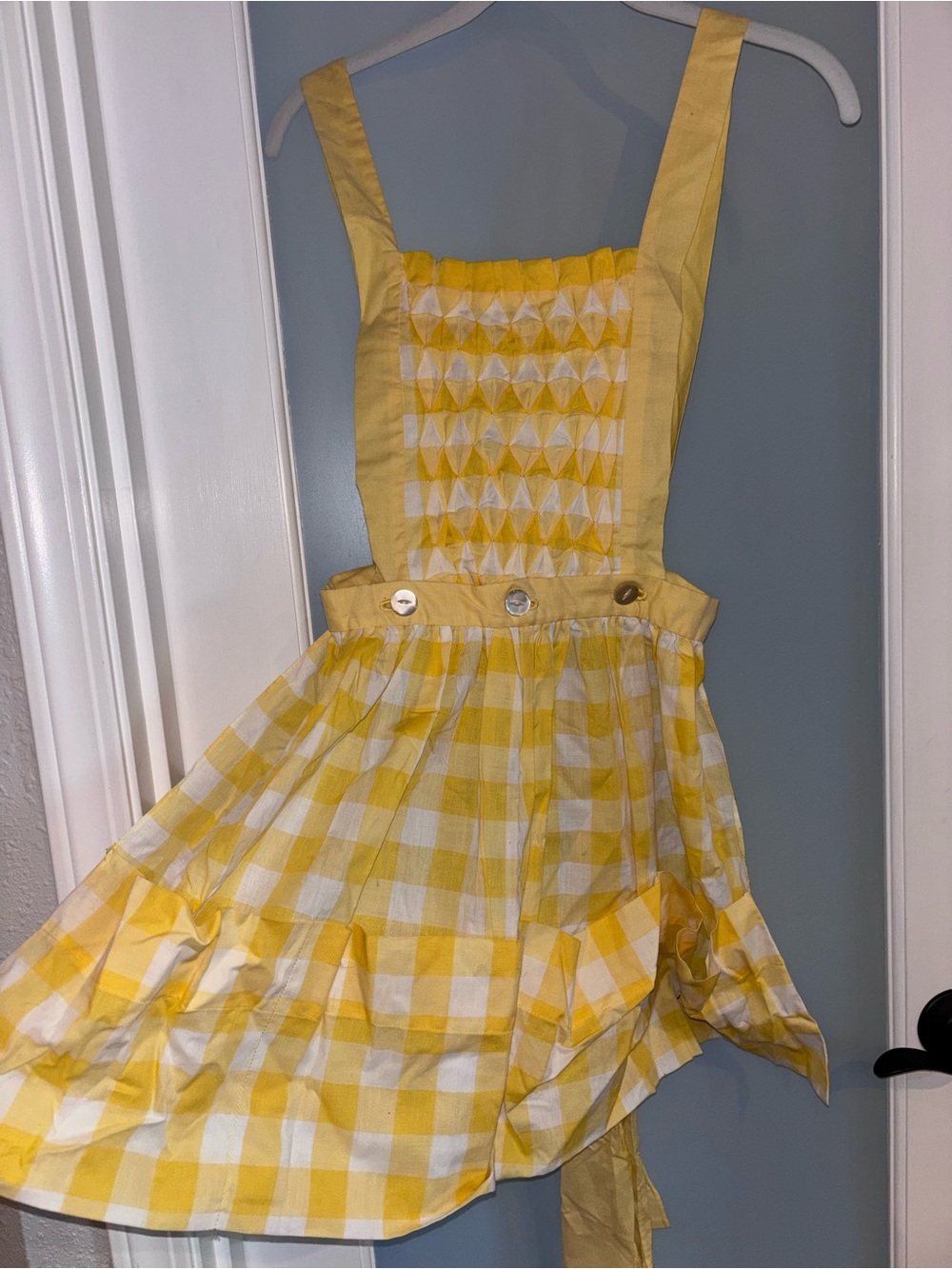 Vintage hand crafted convertible apron. Unbutton to make it a waist only apron.